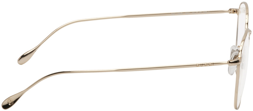 clear and gold gucci glasses