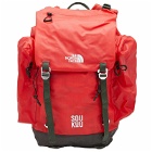 The North Face Men's x Undercover Soukuu Backpack in Dark Cedar Green/High Risk Red