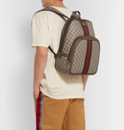 Gucci - Leather and Webbing-Trimmed Monogrammed Coated-Canvas Backpack - Beige