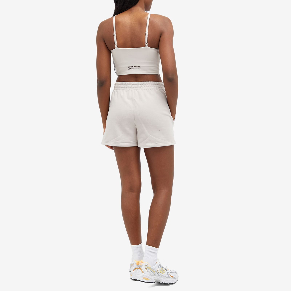 New Balance Women's Linear Heritage Soft Bra Top in Moonrock