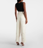Xu Zhi Embellished distressed wide-leg jeans