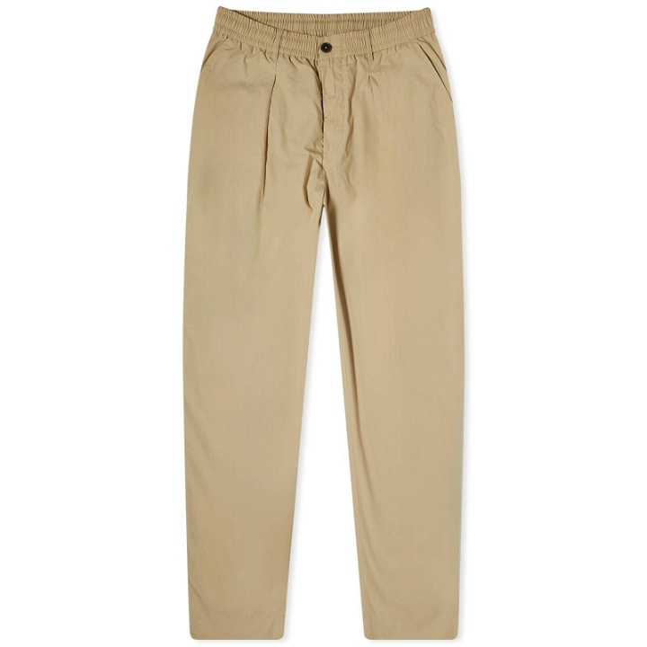 Photo: Universal Works Men's Recycled Poly Oxford Pants in Sand
