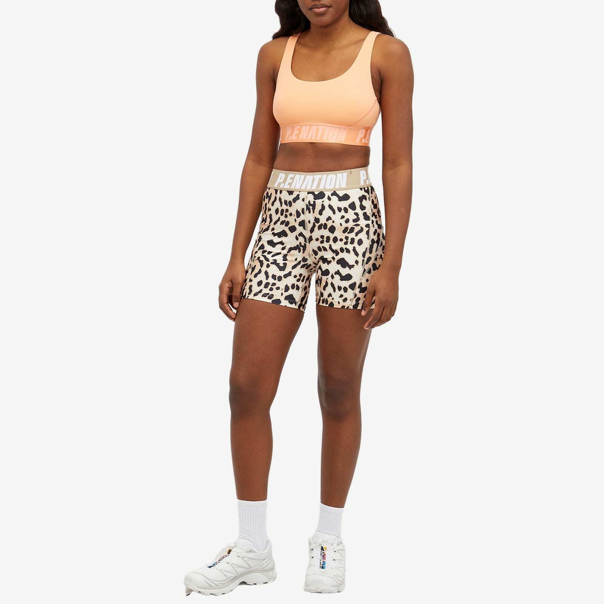 P.E Nation Women's Backcheck Sports Bra in Cantaloupe