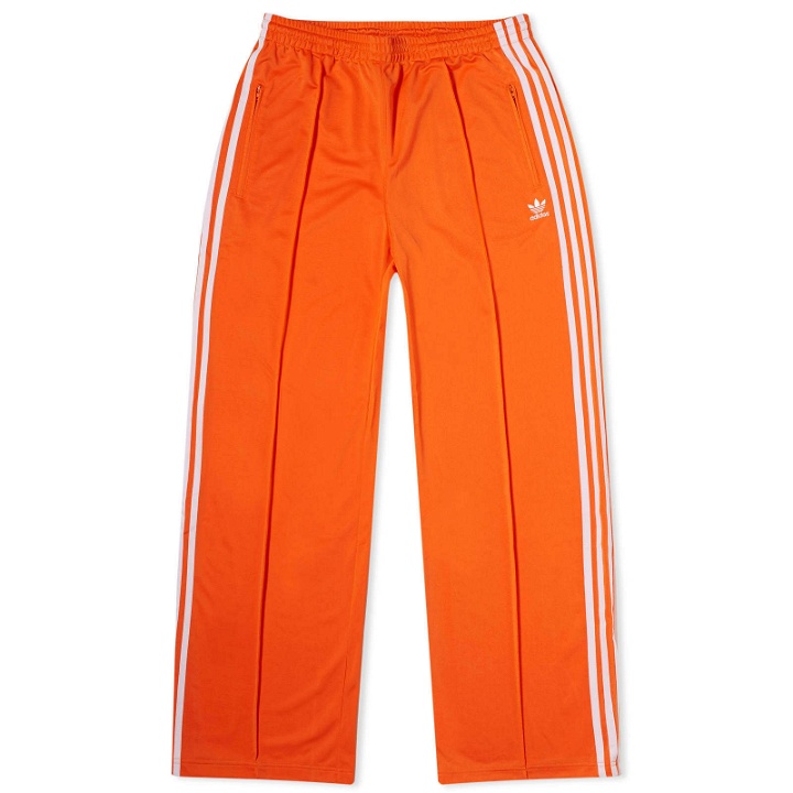 Photo: Adidas Men's Firebird Track Pant in Orange