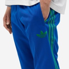 Adidas Men's Adicolor 70s Striped Track Pant in Collegiate Royal