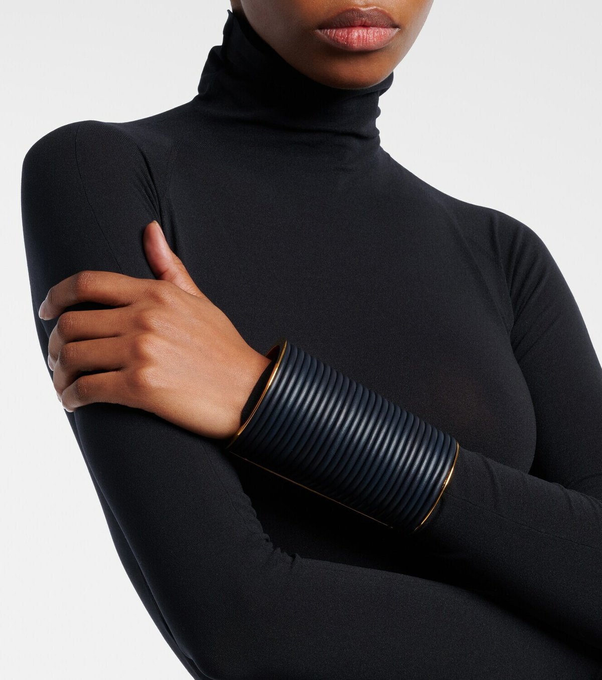 Alaïa Leather-trimmed cuff bracelet