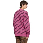VETEMENTS Pink All-Over Logo Sweater