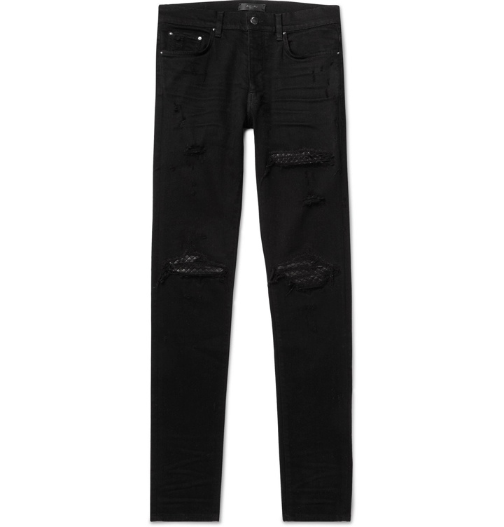 Photo: AMIRI - Skinny-Fit Distressed Panelled Stretch-Denim Jeans - Black