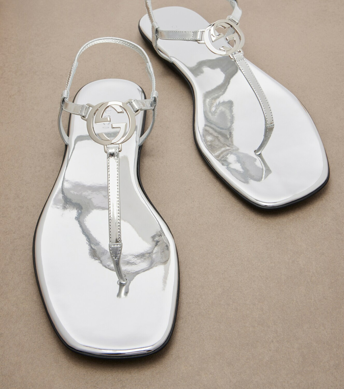 Gucci Interlocking G metallic leather thong sandals