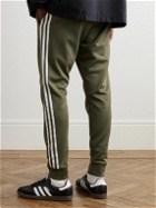 adidas Originals - Tapered Logo-Embroidered Striped Recycled Jersey Sweatpants - Green