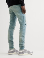 AMIRI - Skinny-Fit Logo-Appliquéd Distressed Jeans - Blue