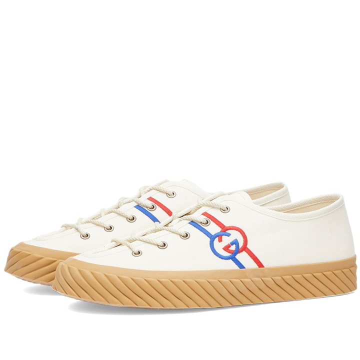 Photo: Gucci Men's Tortuga Logo Sneakers in Ivory