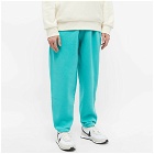 Nike Men's Solo Swoosh Heavyweight Pant in Washed Teal/White