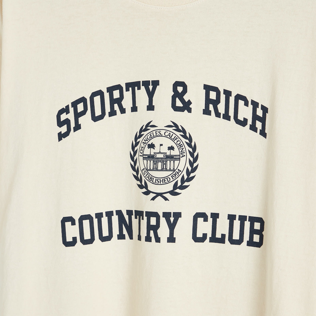 Sporty & Rich Men's Varsity Crest T-Shirt in Cream/Navy