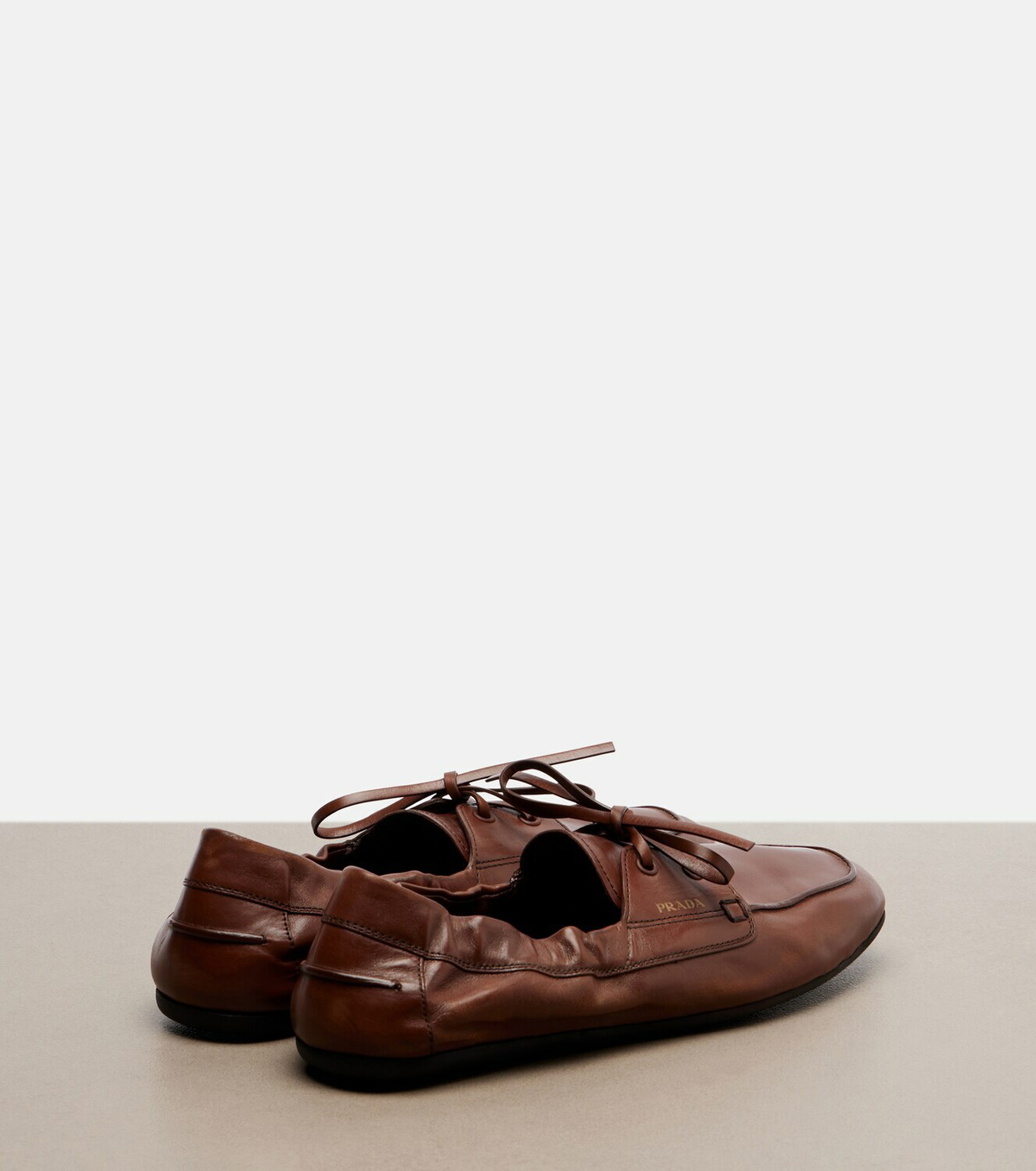 Prada Shuffle leather boat shoes