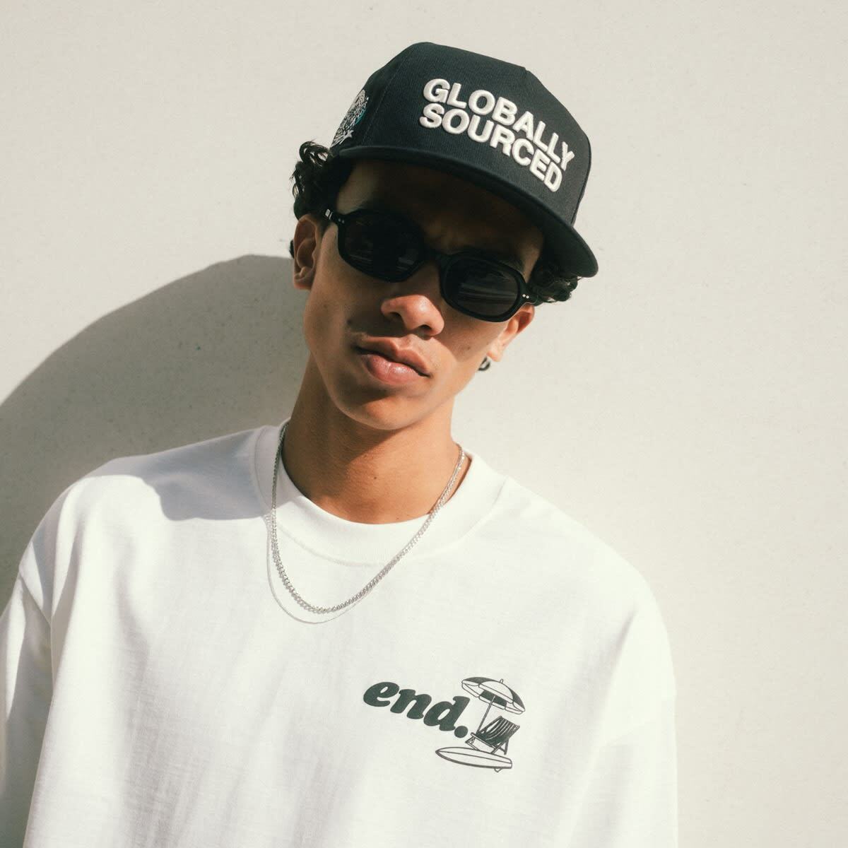 END. Globally Sourced Cap in Black 
