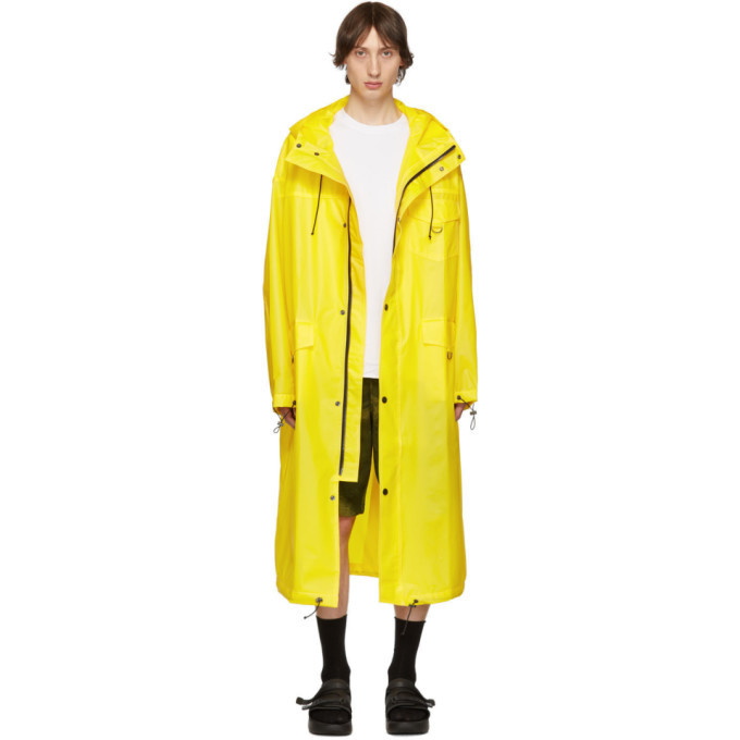 Photo: Pyer Moss Yellow Logo Raincoat