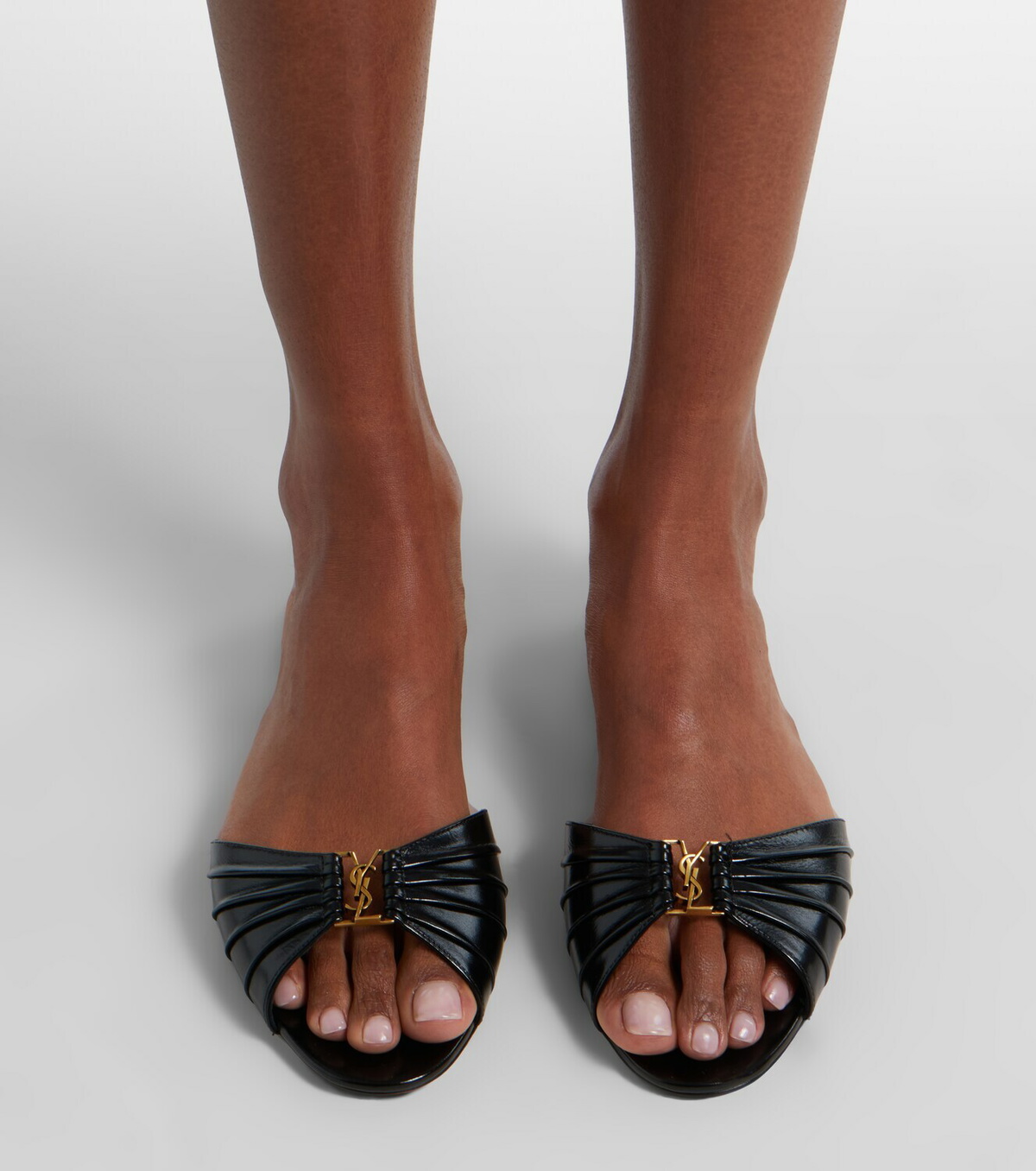 Saint Laurent Cassandre leather slides