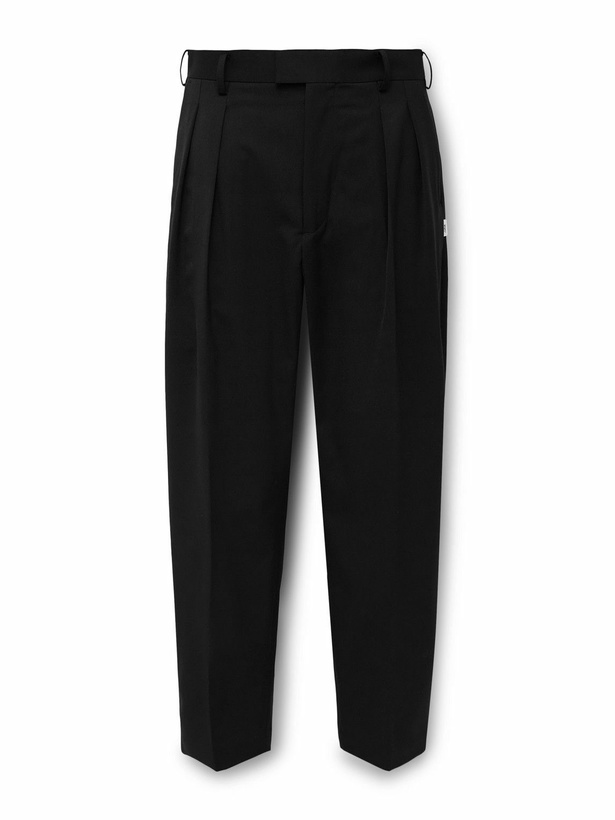 Photo: WTAPS - Cropped Tapered Logo-Appliquéd Pleated Twill Trousers - Black