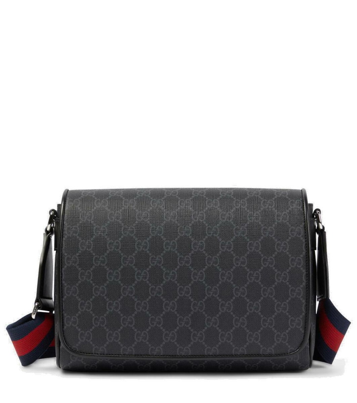 Photo: Gucci Leather-trimmed GG canvas crossbody bag