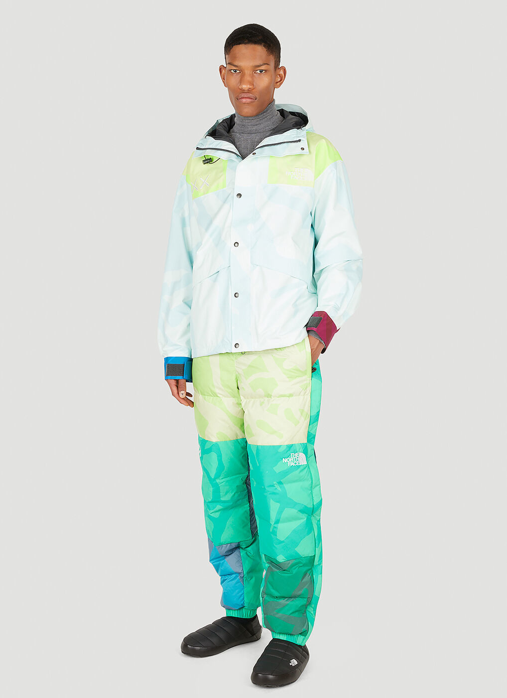 x KAWS 1986 Retro Mountain Jacket in Light Blue The North Face