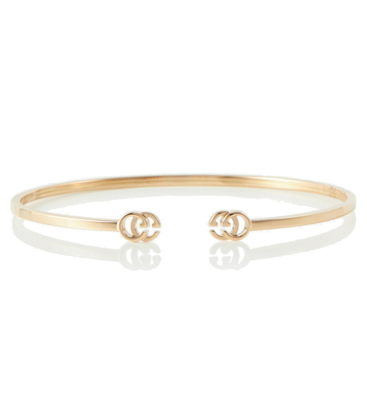 Photo: Gucci - GG Running 18kt gold cuff bracelet