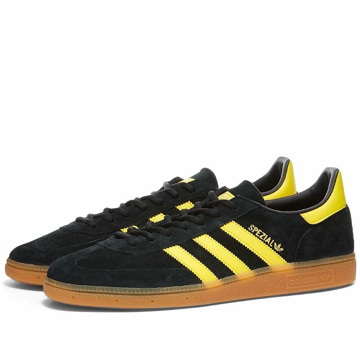 Photo: Adidas Men's Handball Spezial Sneakers in Black/Yellow/Gold