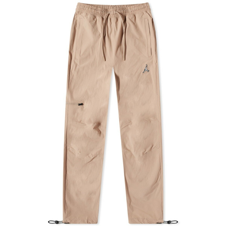 Photo: Nike Men's Air Jordan Essential Woven Pant in Desert/White