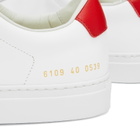 Woman by Common Projects Women's Retro Low Sneakers in White/Red