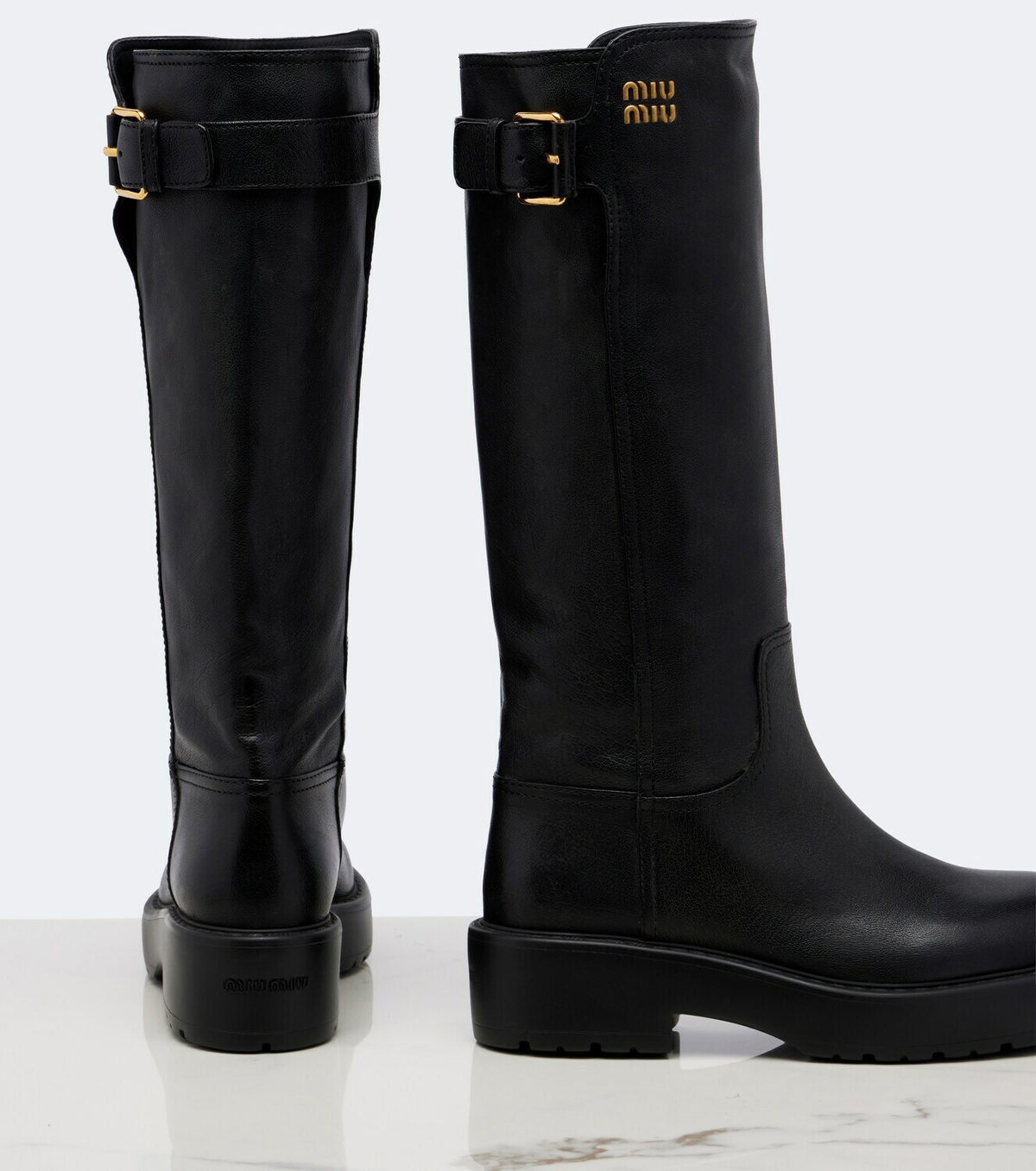 Miu Miu Leather knee-high boots