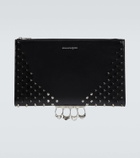 McQueen Four-Ring embellished leather clutch