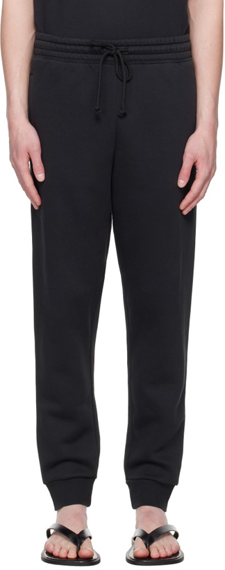 Photo: SKIMS Black Fleece Lounge Tapered Sweatpants
