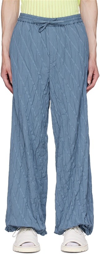 Photo: TAAKK Blue Pleated Trousers