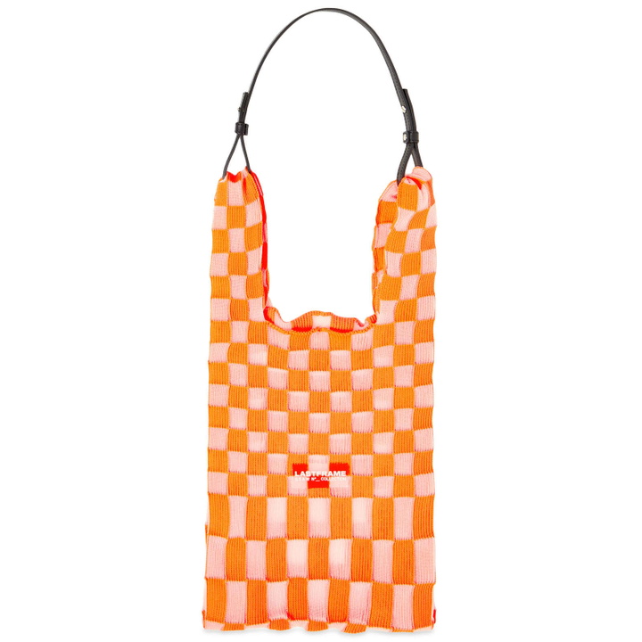 Photo: LASTFRAME Women's Sheer Ichimatsu Market Bag Medium in Neon Orange/Clear