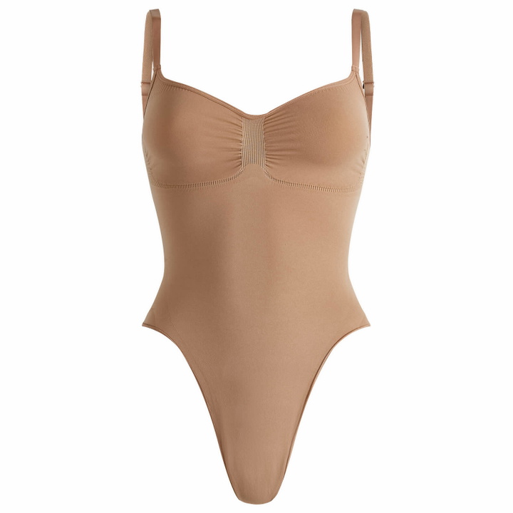 Photo: SKIMS Women's Seamless Sculpt Thong Bodysuit in Sienna