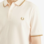 Comme des Garçons SHIRT Men's x Fred Perry Polo Shirt in Peach