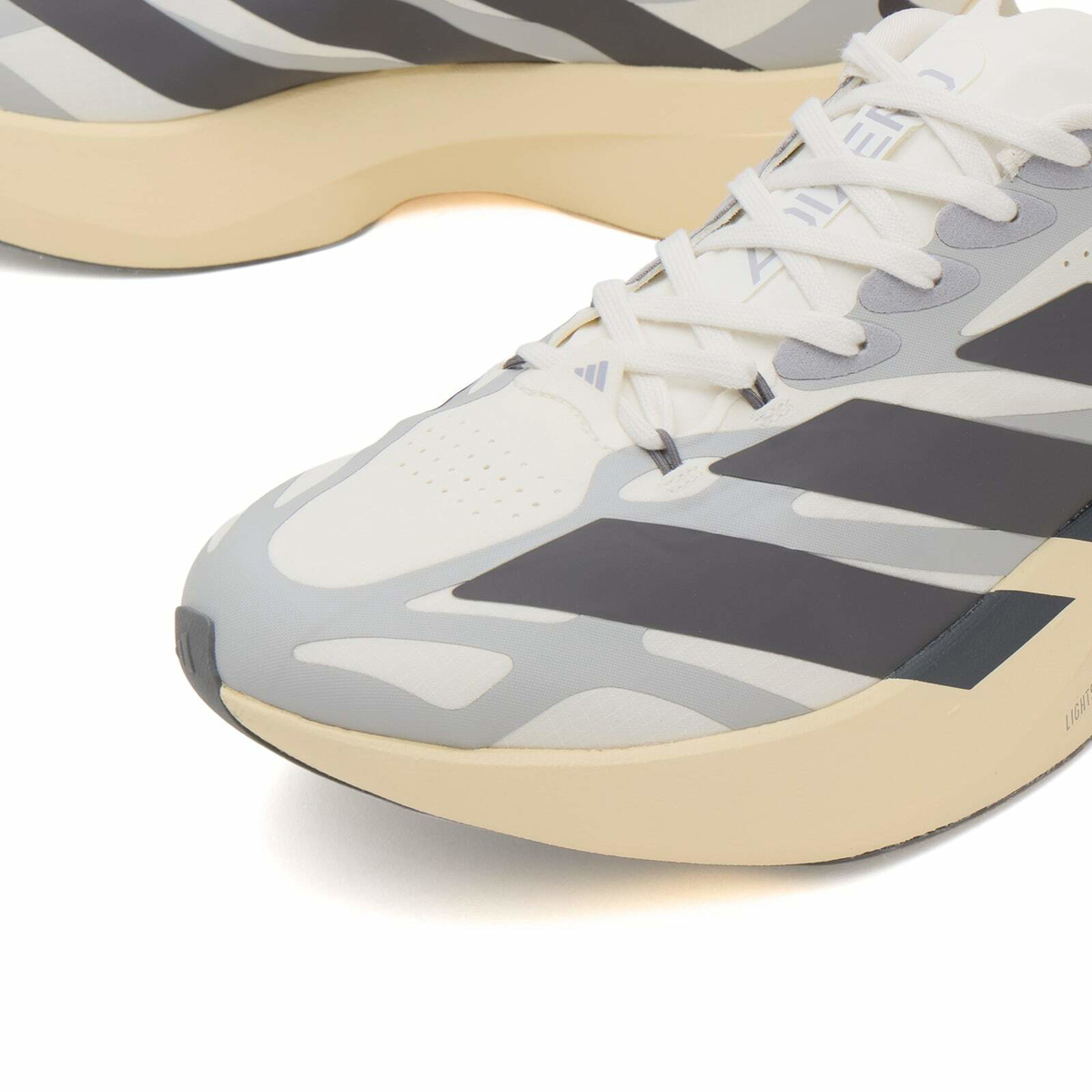 Adidas Men's Adizero Evo SL Exo Sneaker in White/Utility Black/Grey