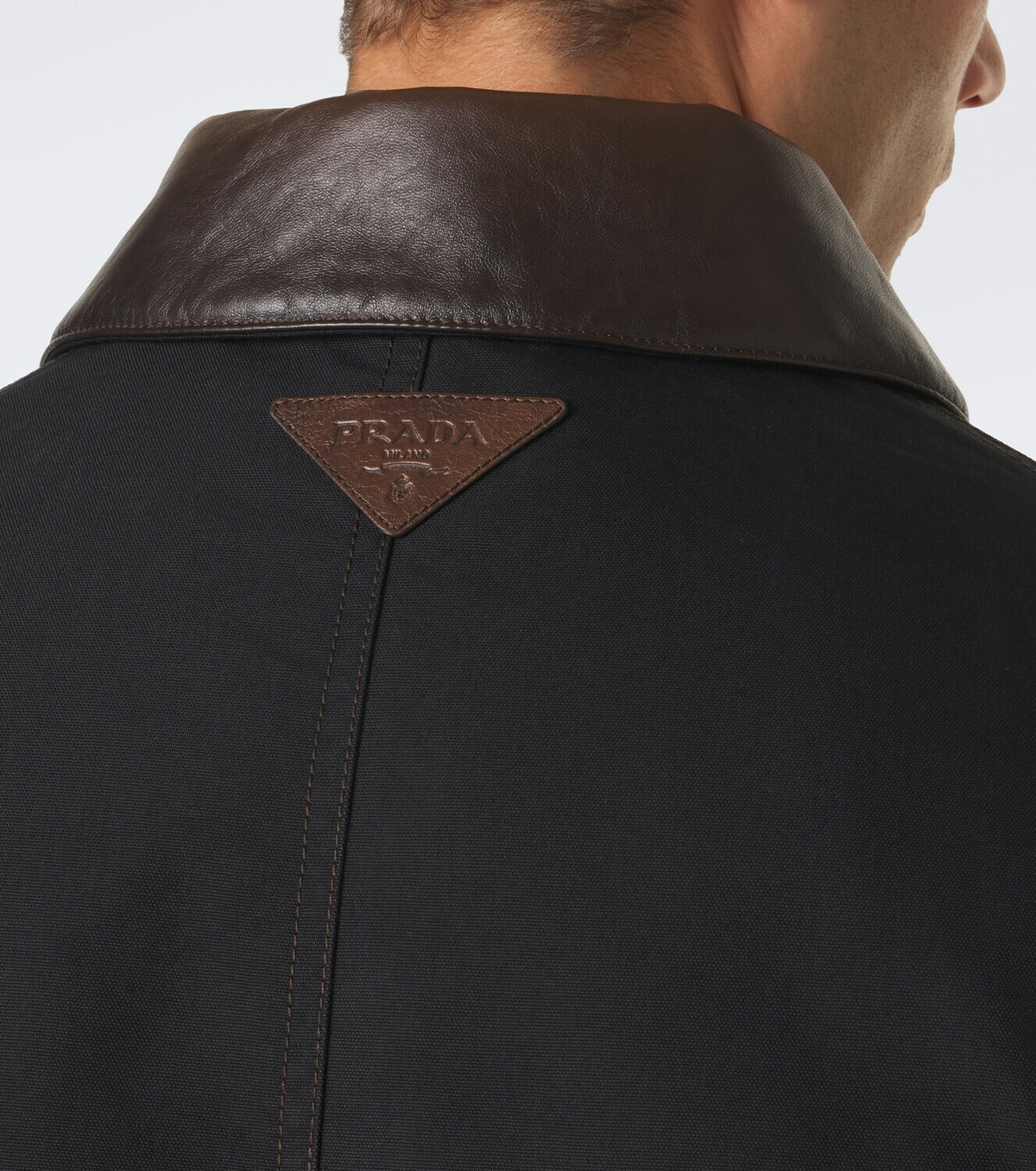Prada Leather-trimmed technical cotton-blend jacket