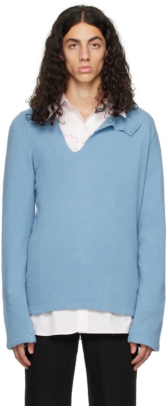 Photo: Comme des Garçons Homme Plus Blue Slashed Sweater