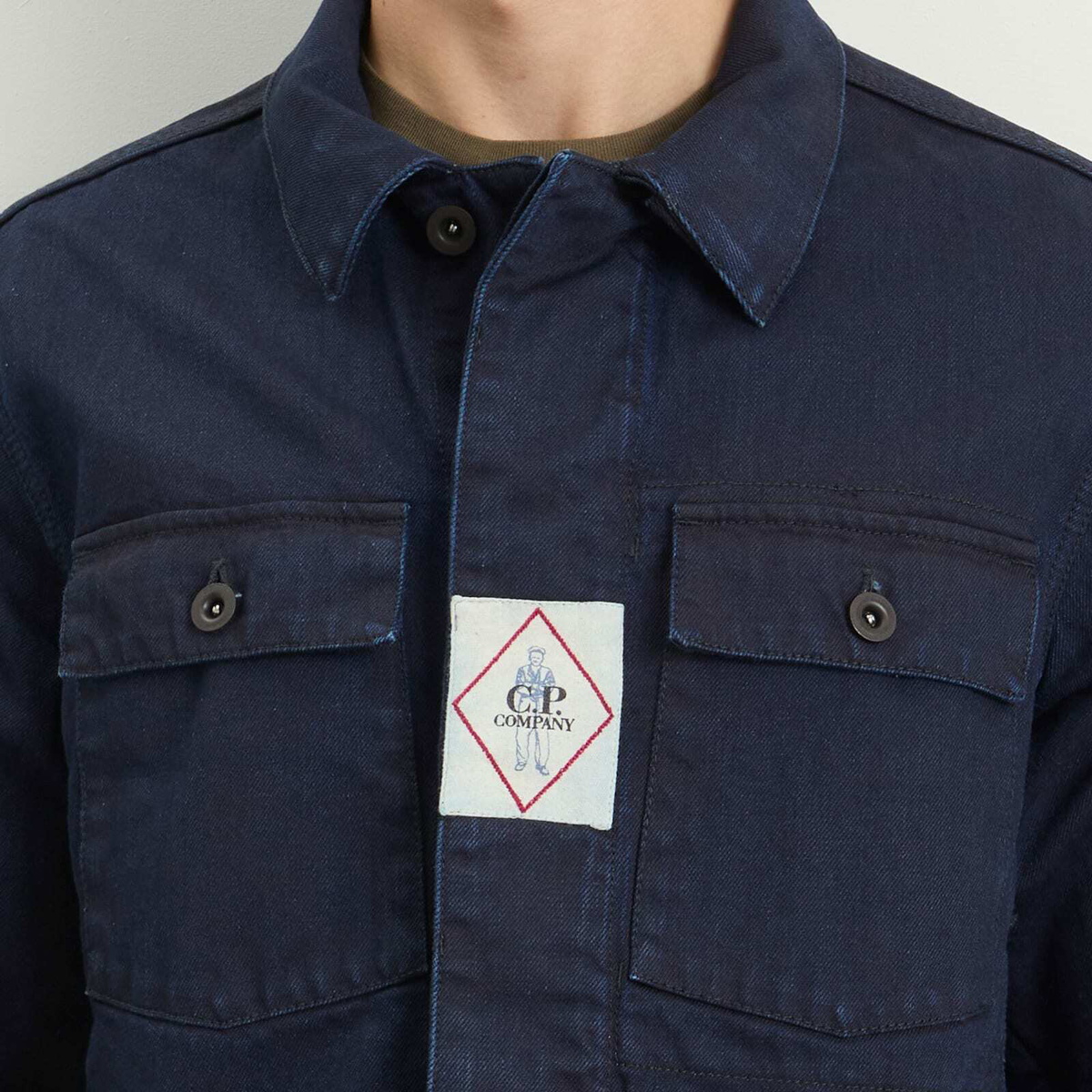 C.P. Company Men's Plated Denim Work Jacket in Washed