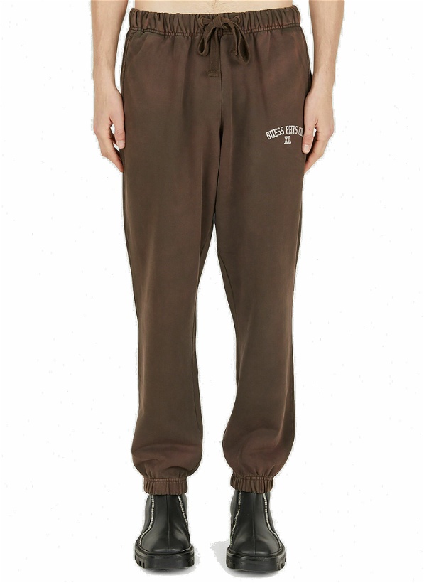 Photo: Embroidered Logo Track Pants in Brown