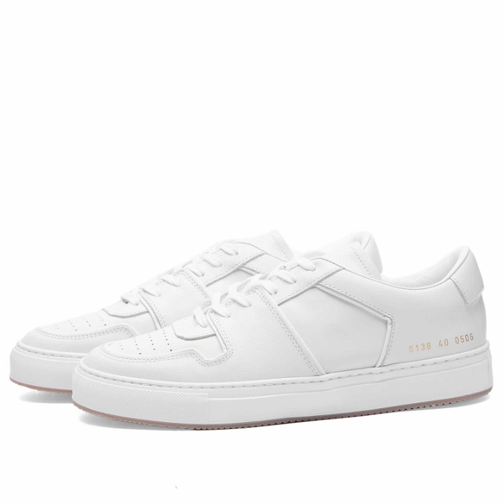 Photo: Woman by Common Projects Women's Decades Low Trainers Sneakers in White