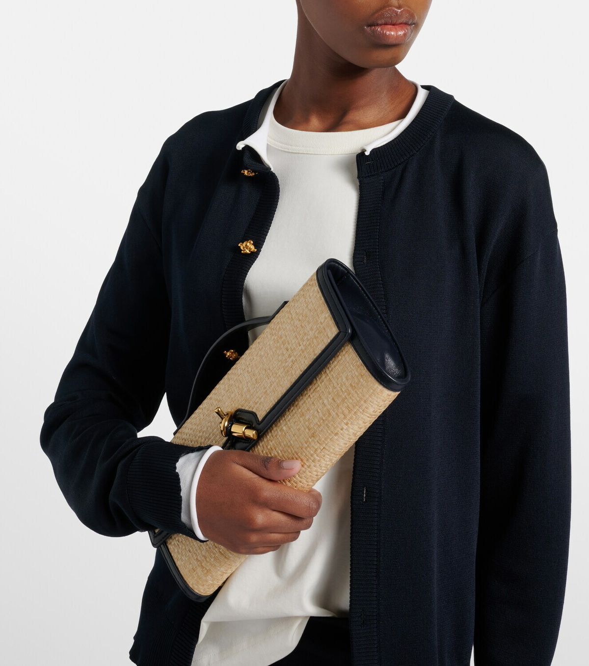 Bottega Veneta Andiamo leather-trimmed raffia clutch