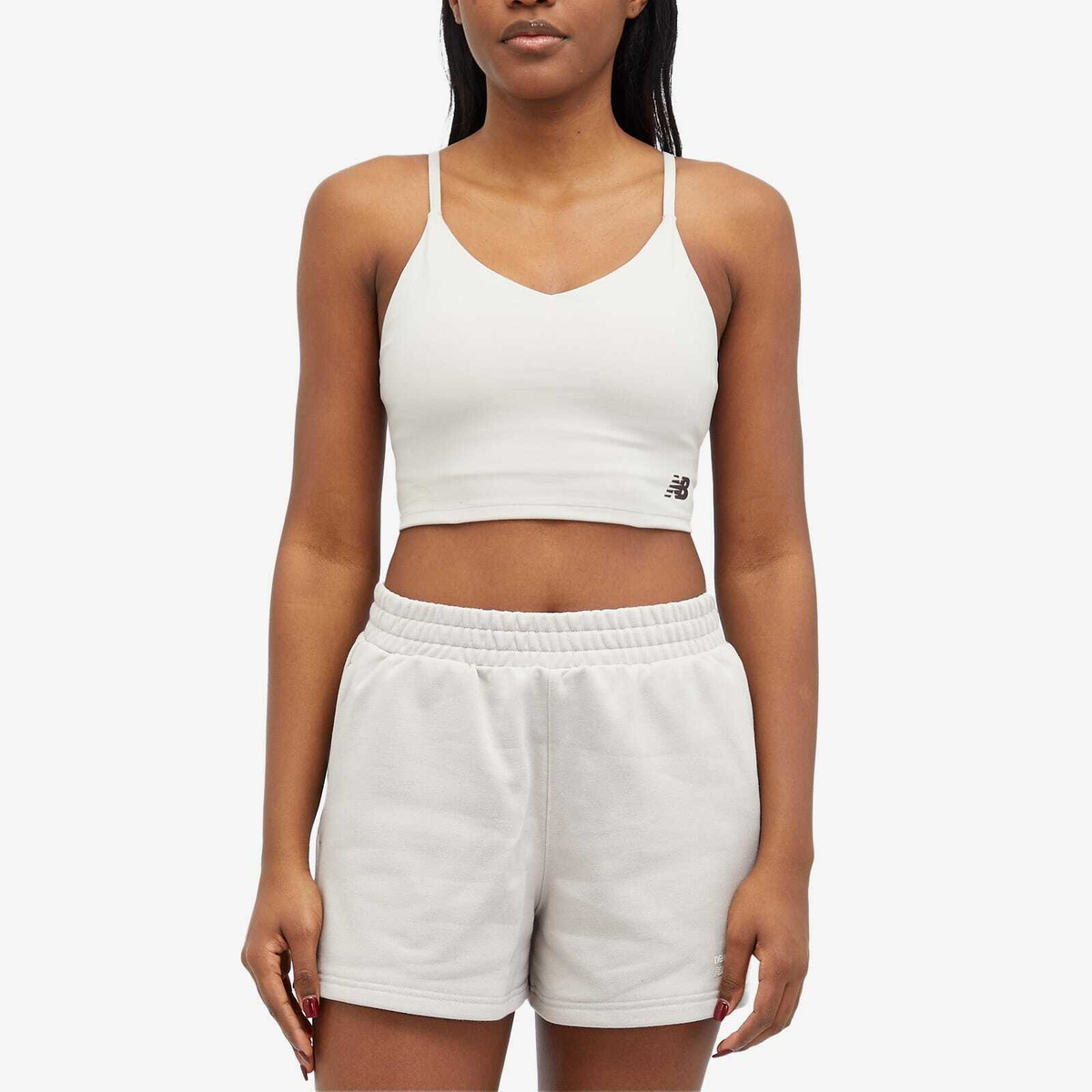 New Balance Women's Linear Heritage Soft Bra Top in Moonrock