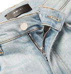 AMIRI - MX1 Skinny-Fit Panelled Distressed Stretch-Denim Jeans - Men - Light blue