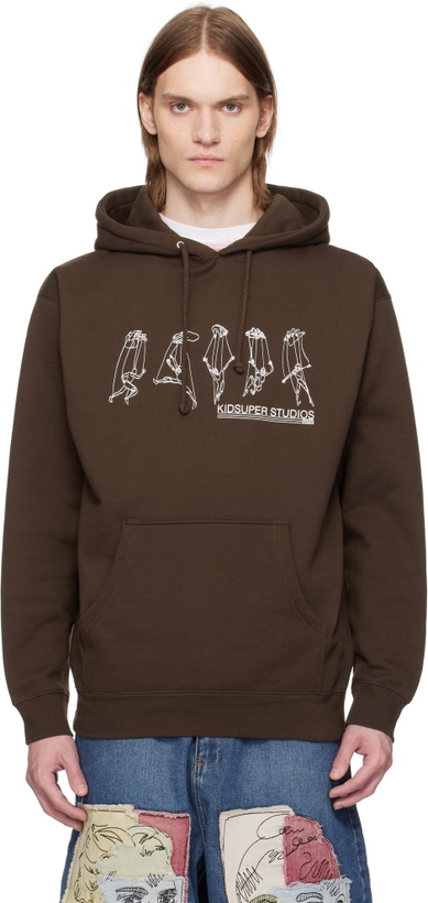 Photo: KidSuper Brown String Puppet Hoodie