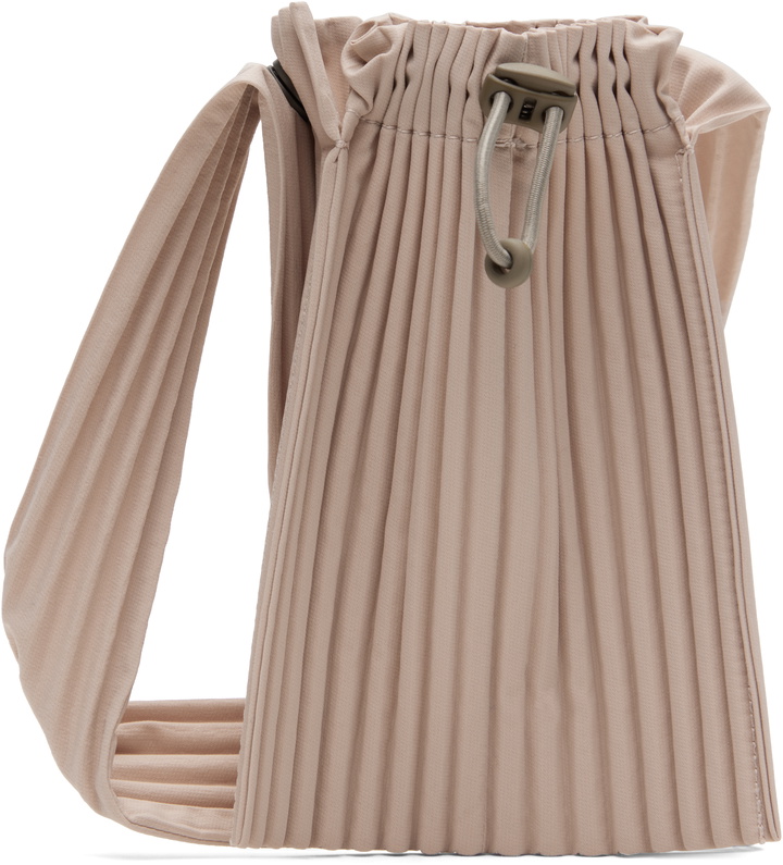 Photo: HOMME PLISSÉ ISSEY MIYAKE Pink Pocket Bag