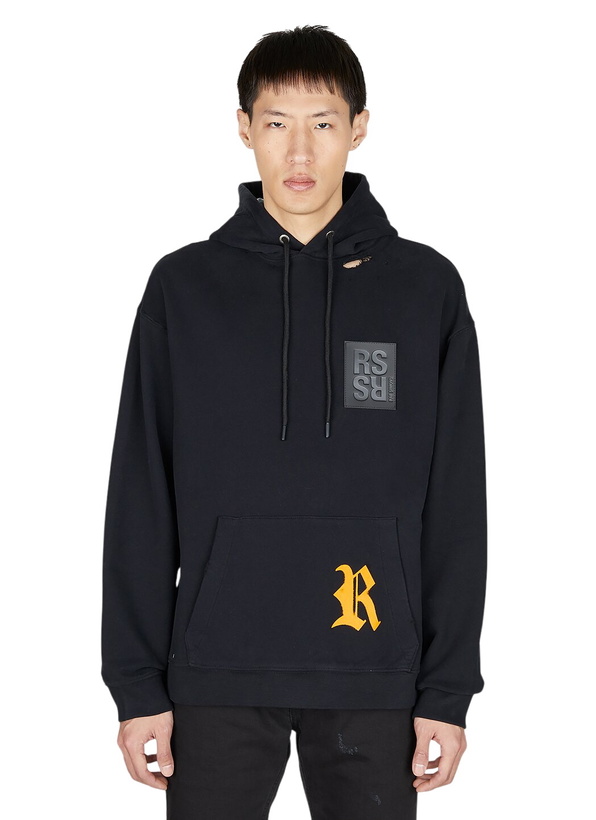 Photo: Raf Simons Destroyed Logo Patch Hooded Sweatshirt