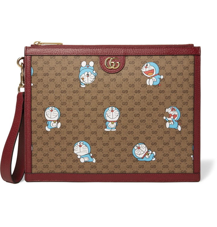 Photo: GUCCI - Doraemon Leather-Trimmed Printed Monogrammed Coated-Canvas Pouch - Brown