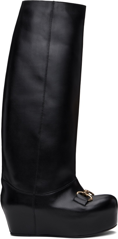 Photo: LAURA ANDRASCHKO Black Riding Buckle Tall Boots